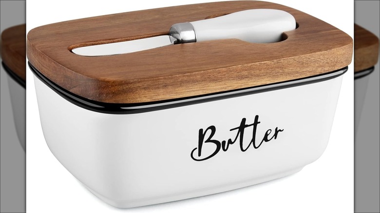 White butter dish with wooden lid and knife