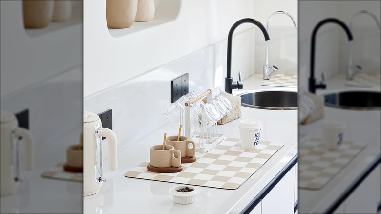 Checkered dish drying mat on white counter