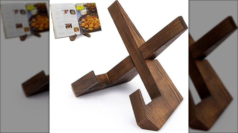 Wooden cookbook holder on white background