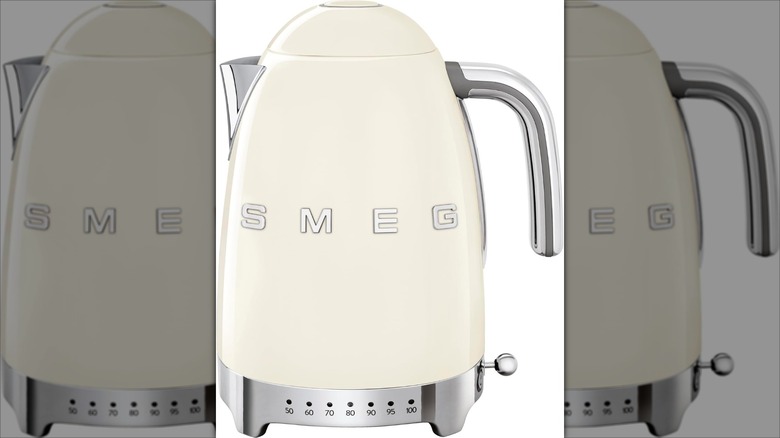 White Smeg electric kettle with silver accents
