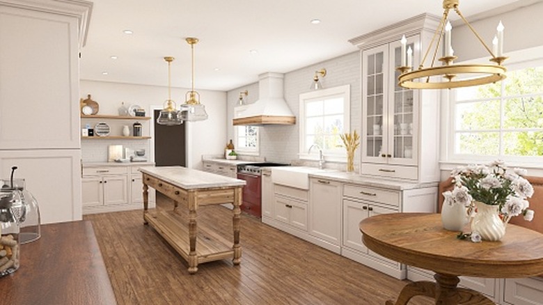 View of warm white and wood farmhouse kitchen