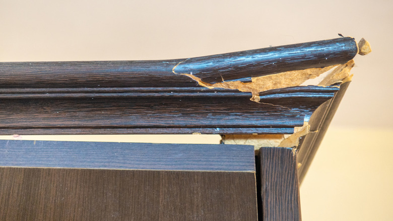 Corner of broken wooden cabinet