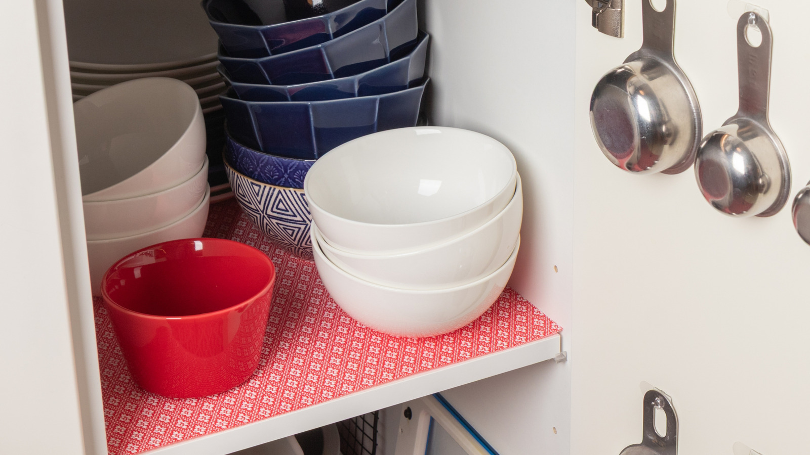Instead Of Buying Kitchen Shelf Liner, Repurpose This Leftover Material You Probably Have Rolled Up