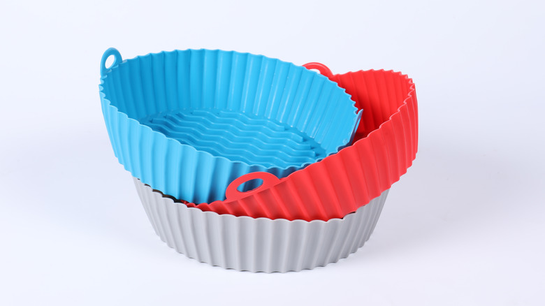 Stack of three silicone air fryer liners