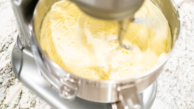 close up of a cake batter in a stand mixer