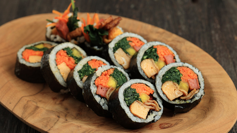 kimbap on wood plate