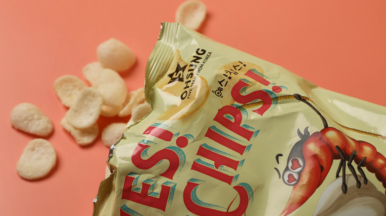 Chips spilling from bag of Yes! Chips!