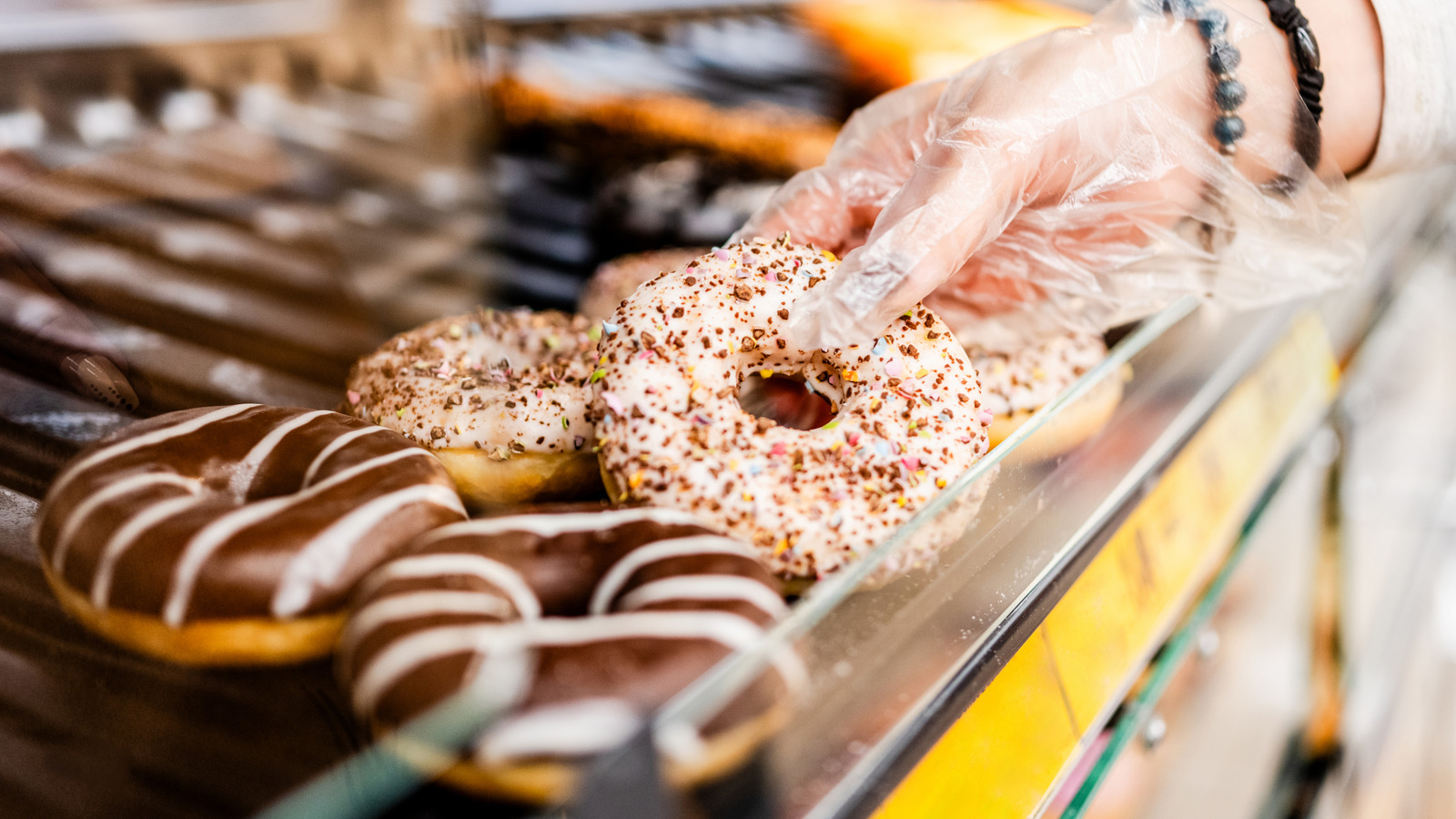 Krispy Kreme Vs Dunkin: Who Actually Has The Cheaper Donuts? - Tasting Table