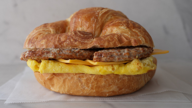 sausage egg and cheese on croissant