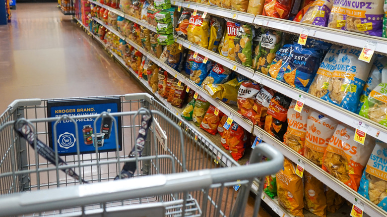 Kroger shopping cart in chip aisle