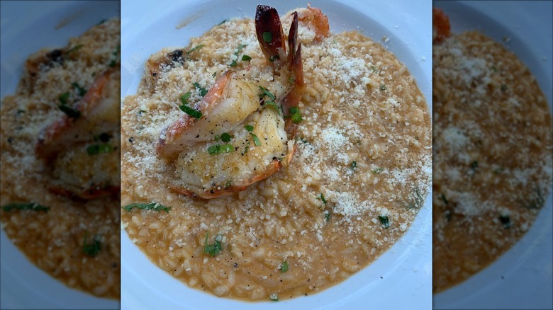 A plate of shrimp risotto with parmesan