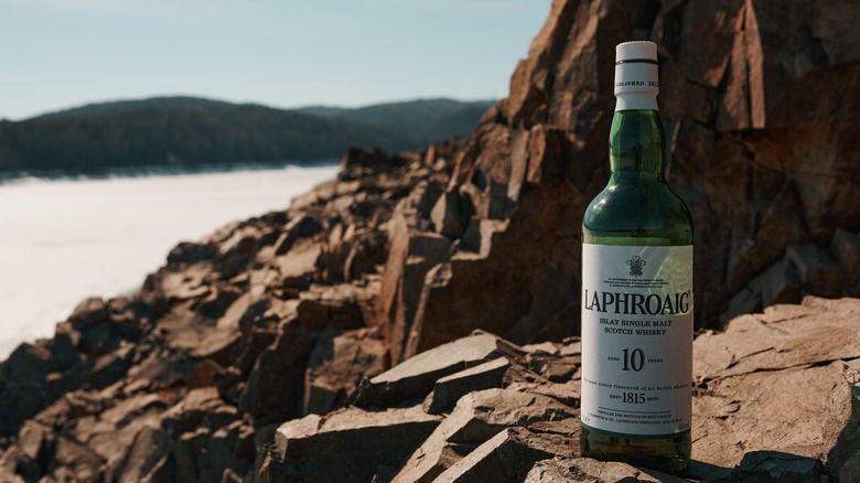 Laphroaig 10 Year bottle on rocks