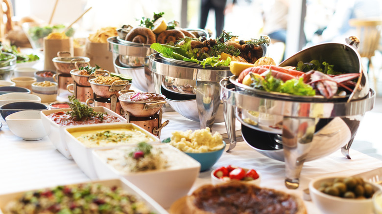 ornate lobster buffet with side dishes