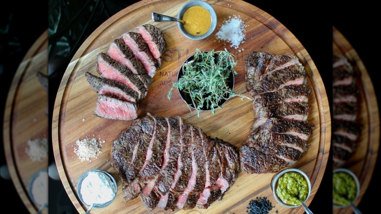 BOA Steakhouse trio of steak on wooden board