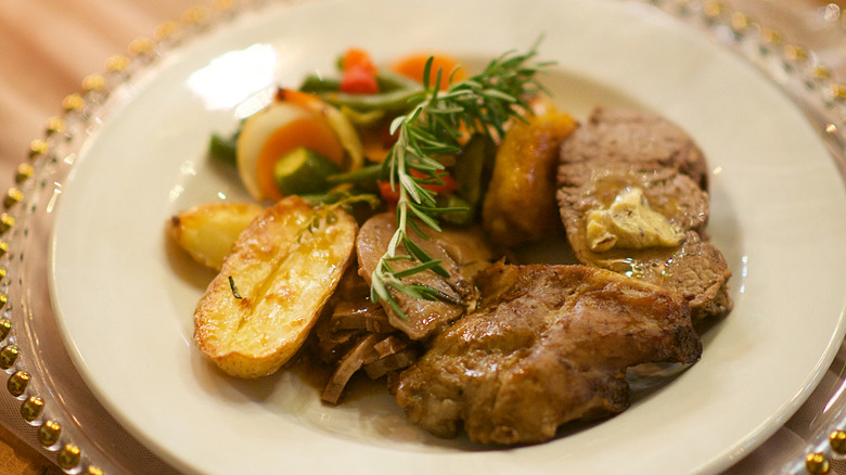 Plated fillet with vegetables at a high-end steakhouse