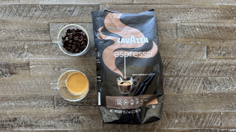 Espresso Italiano coffee with beans and cups