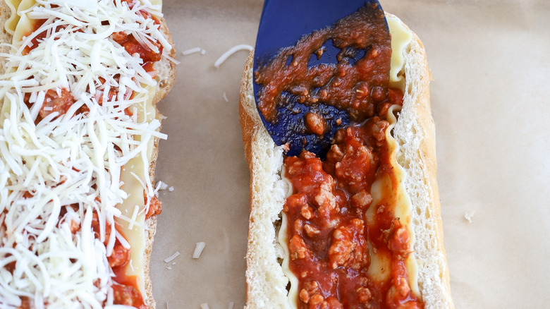 filling bread with lasagna ingredients