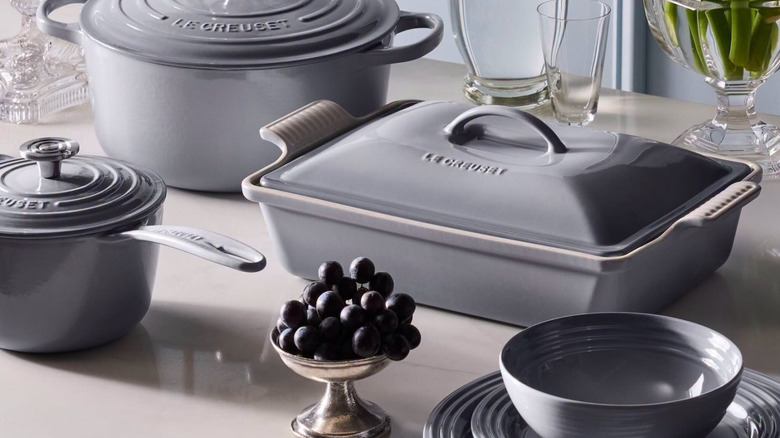 A Le Creuset collection with pots and pans