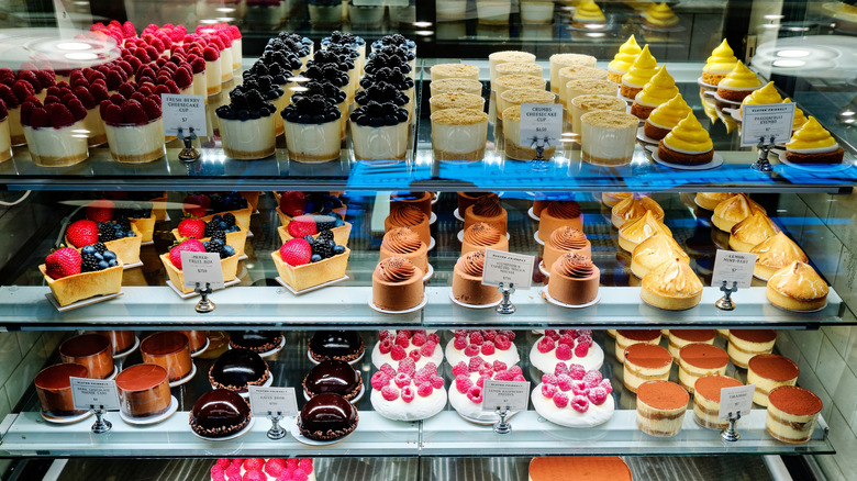 Confections in full bakery display case.