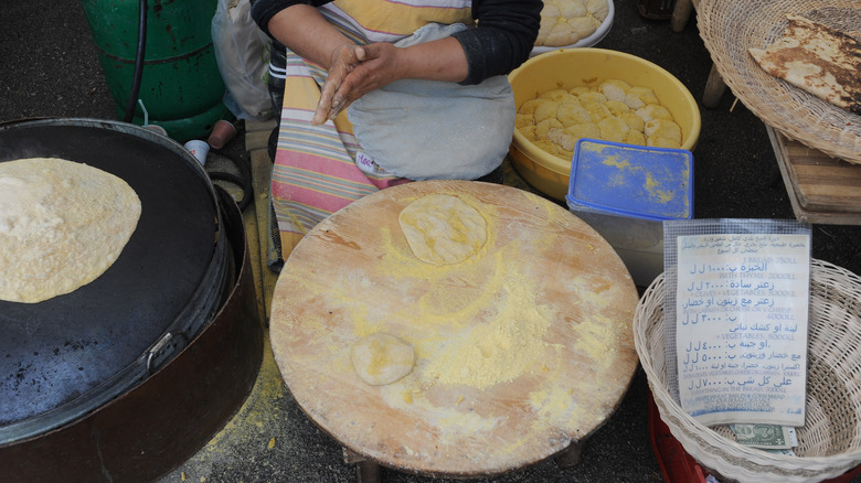 Making Lebanese bread at market 