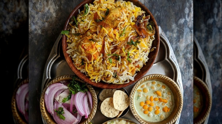 rice biryani with onions and Green indian stew