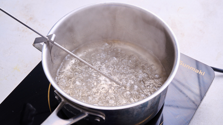 boiling sugar in a pot