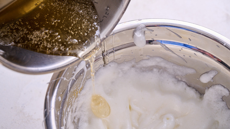pouring sugar syrup into bowl