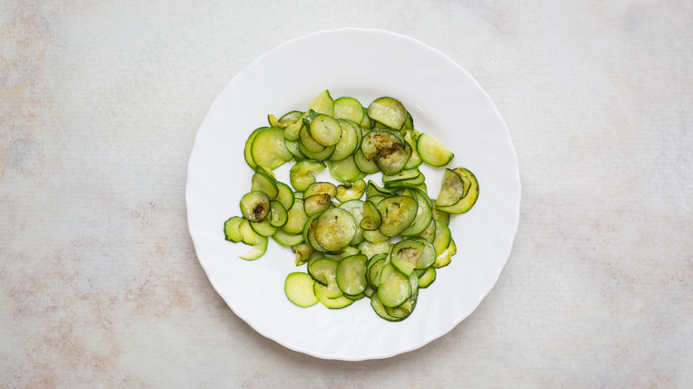 zucchini slices on white plate