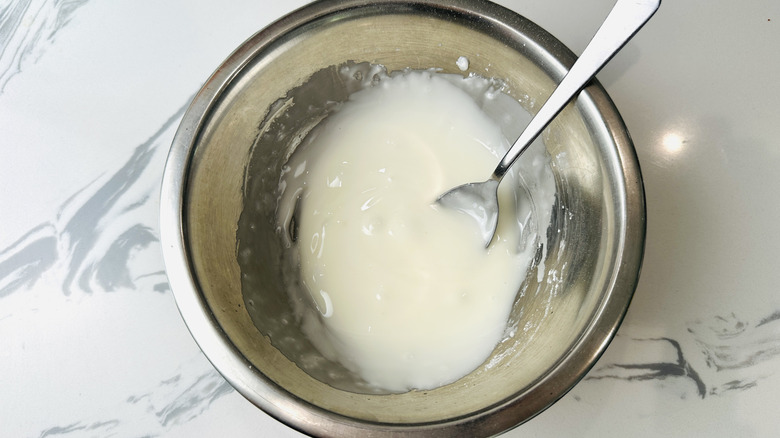 Glaze in bowl with spoon