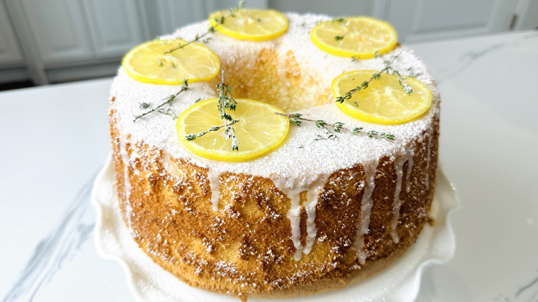 Decorated lemon thyme chiffon cake on cake stand