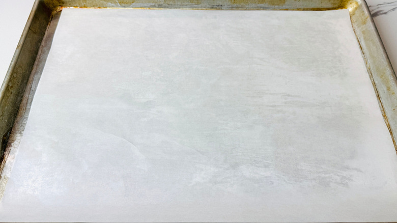 Baking sheet lined with parchment paper