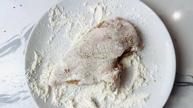 Dredged chicken in flour