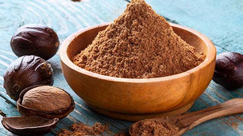 Fresh nutmeg nut, shell, and ground