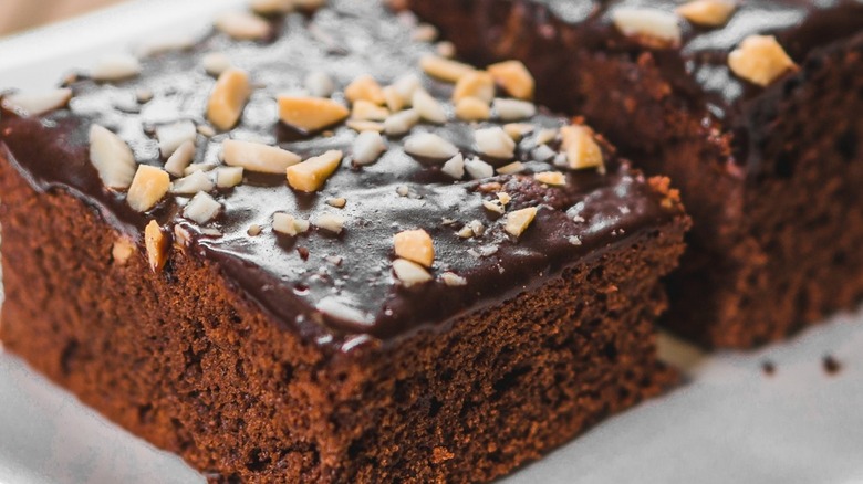 Close-up of walnut-topped brownies