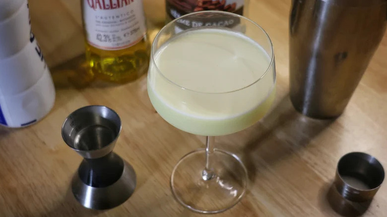 Close up view of Golden Cadillac cocktail served in a coupe glass