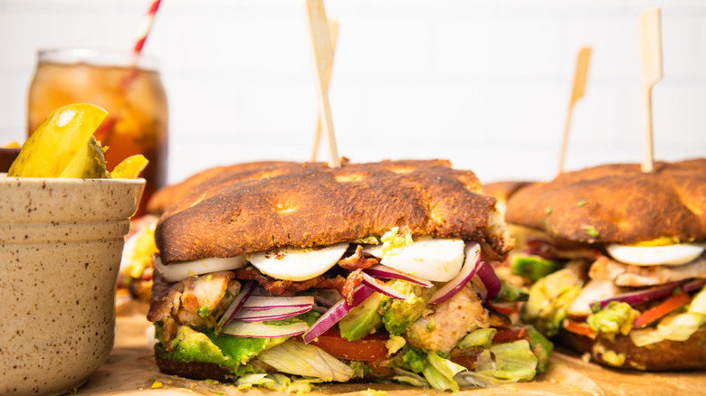 two loaded Cobb sandwiches from the side
