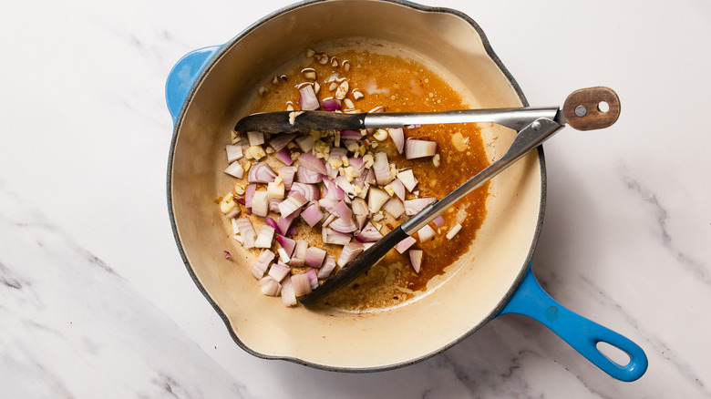 Shallots and garlic in pan