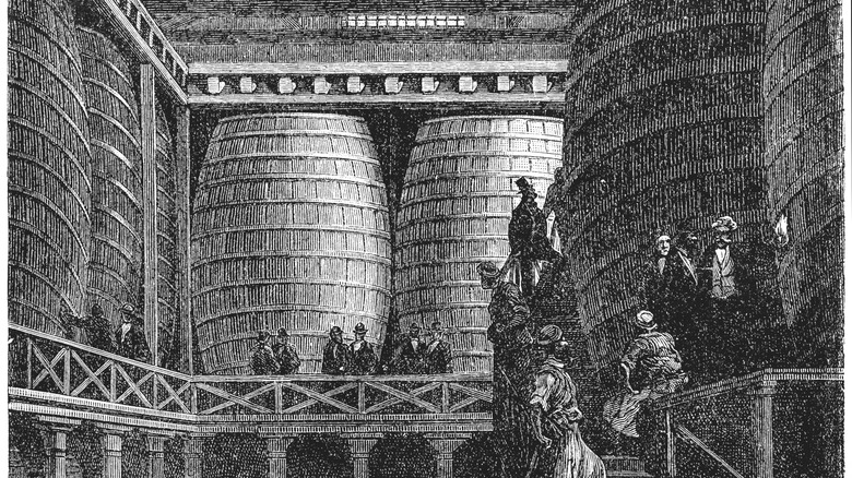 Drawing of people standing near tall vats of beer in 19th century London