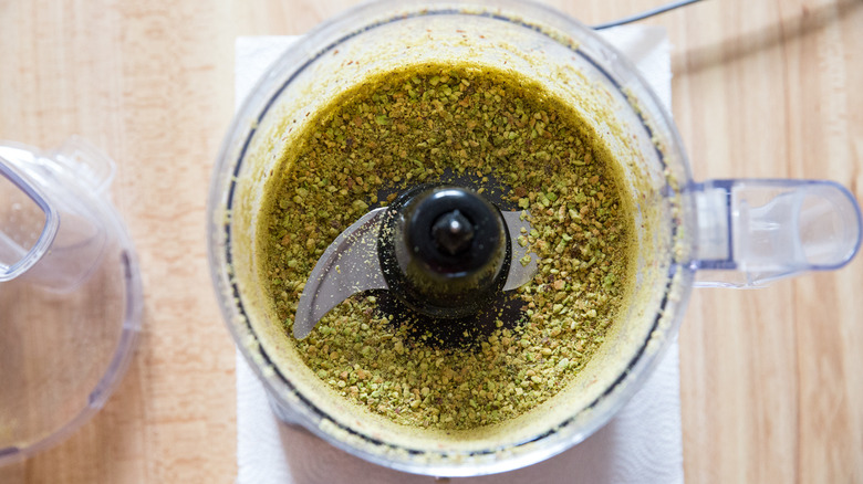 chopped pistachios in food processor