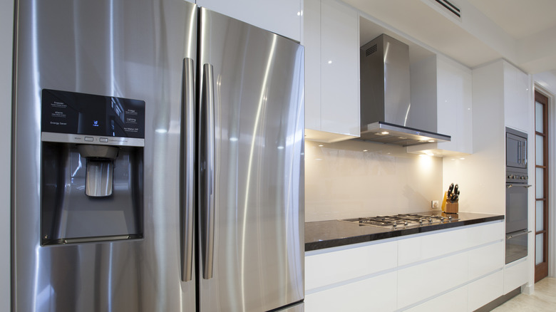 Large stainless-steel refrigerator in a kitchen