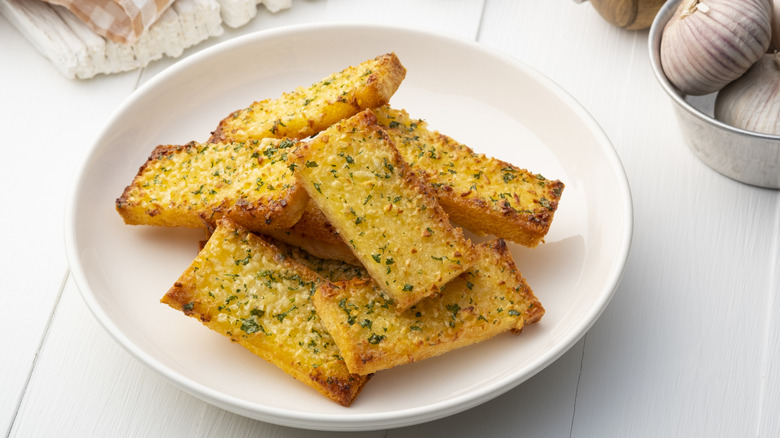 Crispy Garlic Bread on white plate