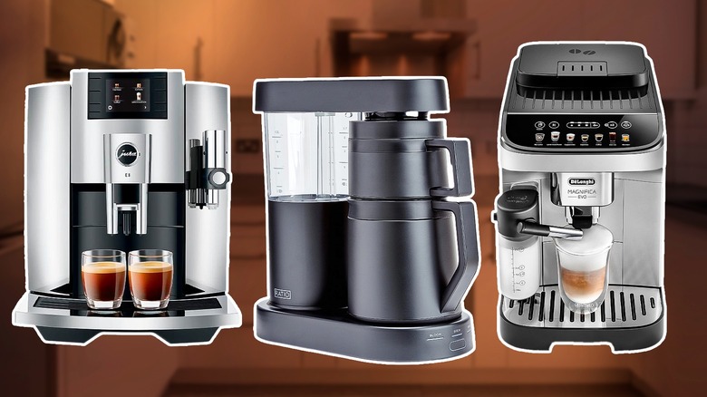 Three luxury coffee machines against a blurred backdrop of a home kitchen