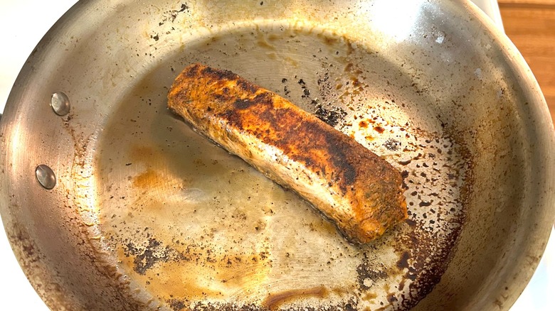 Pan searing a salmon filet in a Made In 10" skillet