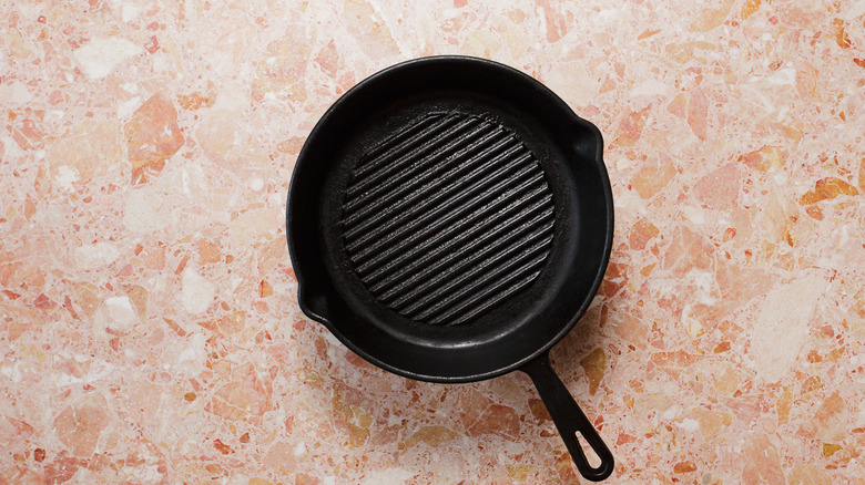 Preheated cast iron pan