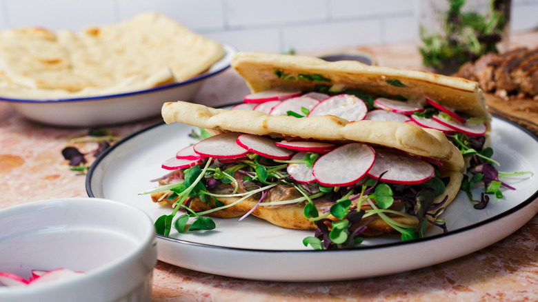 Two ahi tuna sandwiches on plate