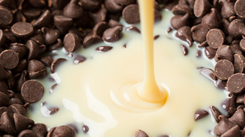 chocolate chips and sweetened condensed milk in a bowl