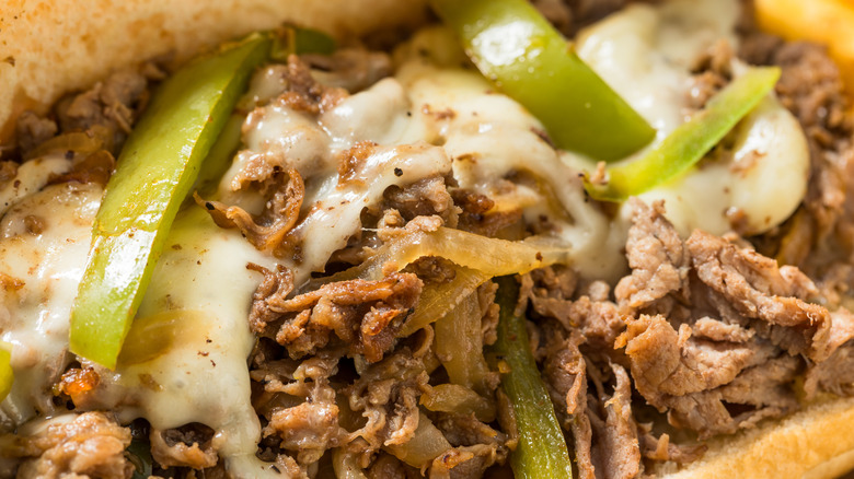 closeup of a Philly cheesesteak sandwich