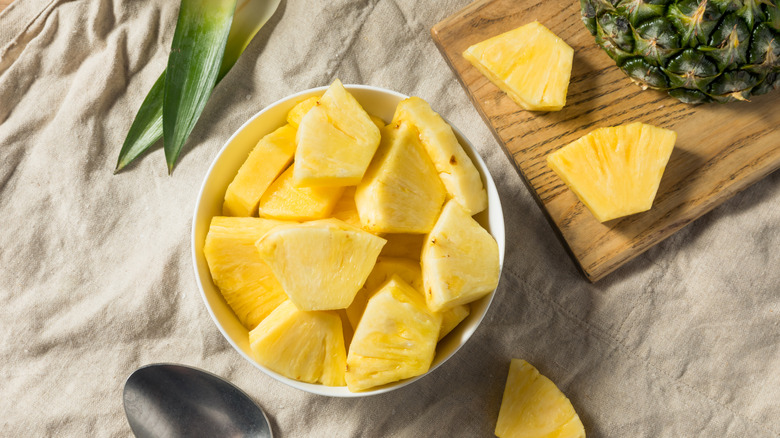 A bowl of fresh pineapple chunks