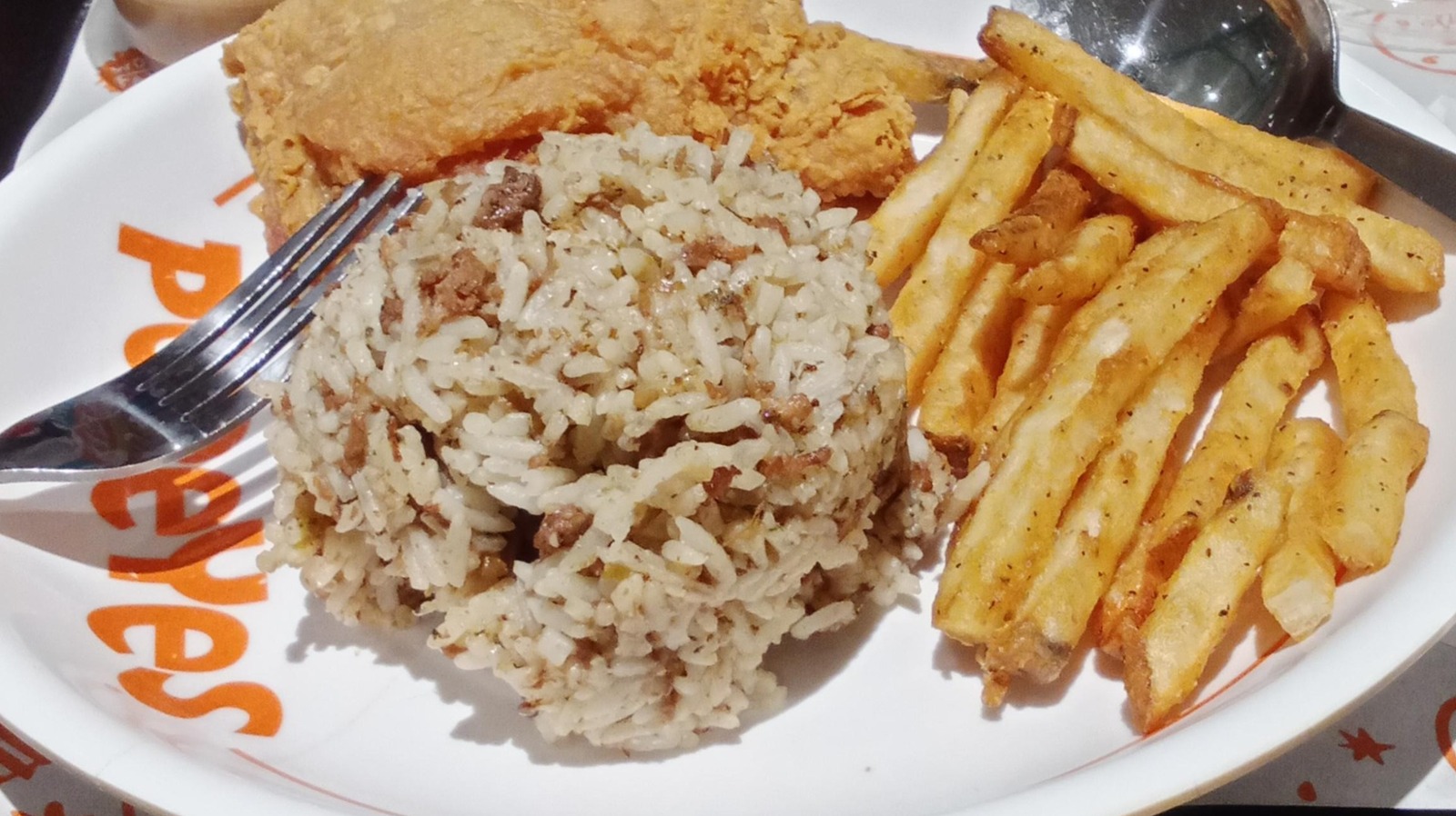 Make Popeyes Cajun Rice 10X More Flavorful When You Request These 2 Items With It