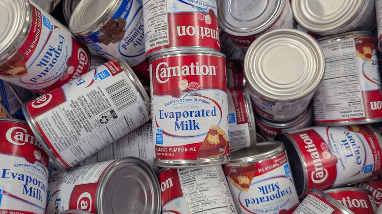 Cans of Carnation evaporated milk